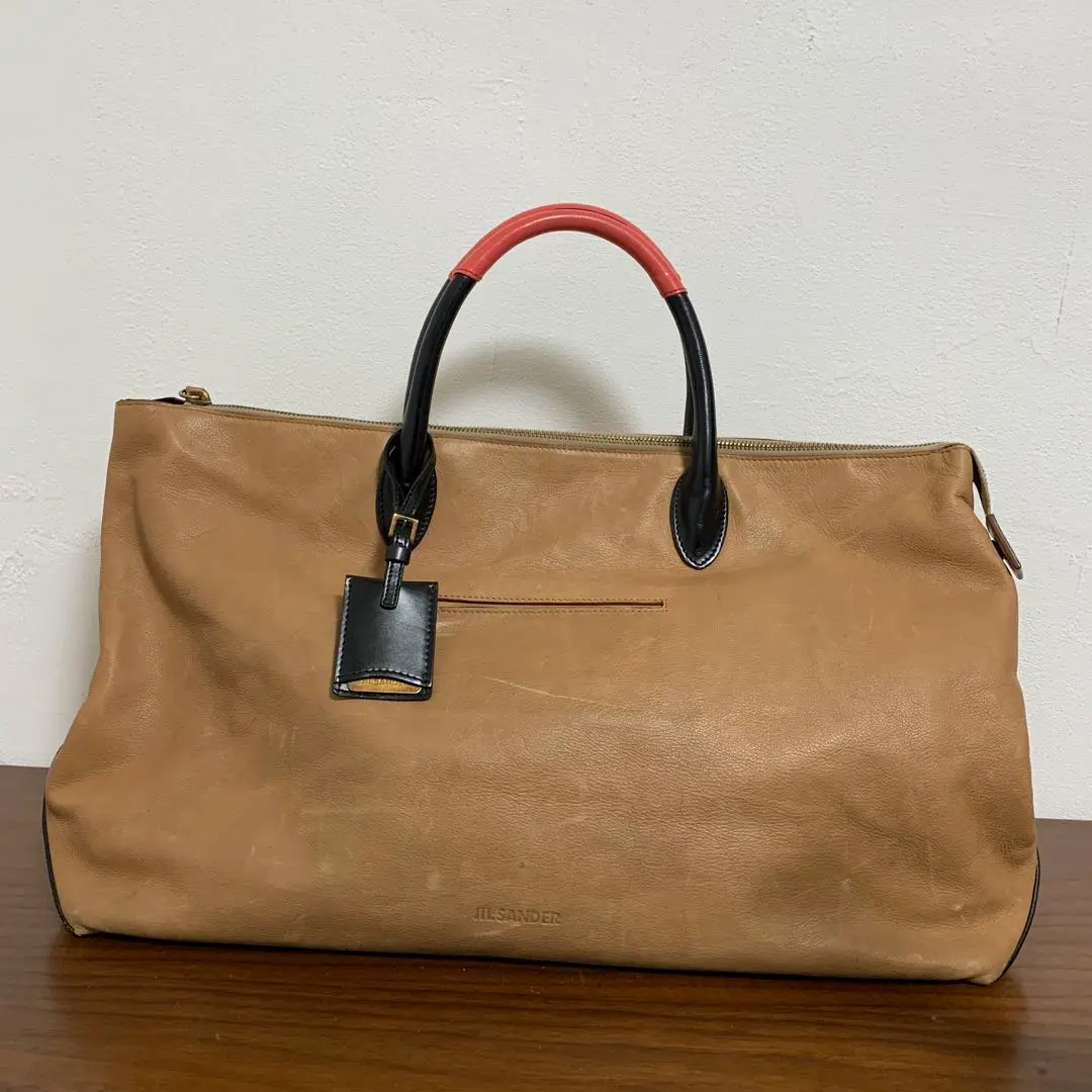 ジル サンダーのメンズバッグ、留め具のないフラップ付きレザー