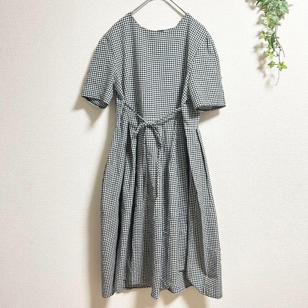 Thumbnail of BAGUNIANG Block Check Pattern Belted Short Sleeve Collarless Dress with Ribbon