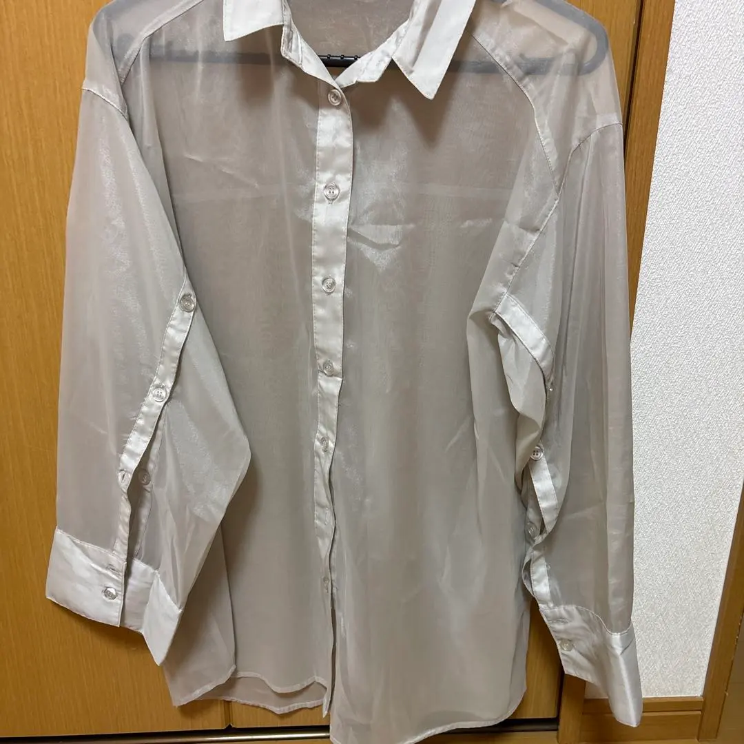 Thumbnail of Sheer long-sleeved shirt, size M, cream color