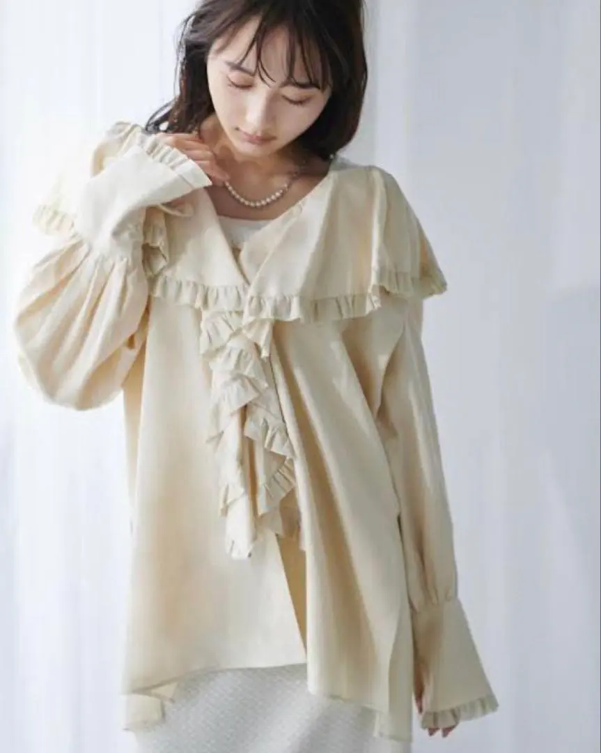 Thumbnail of New with tags, unused. Linen-mix cascade ruffle blouse. Size 2.