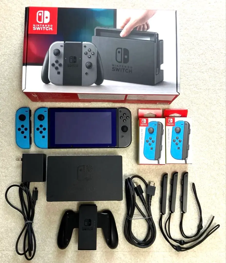 Thumbnail of Nintendo Switch with all accessories, including 3 Joy-Cons