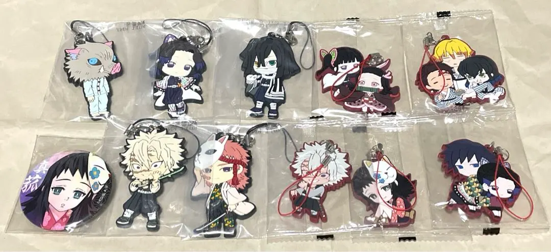 Thumbnail of Demon Slayer rubber straps and badges set