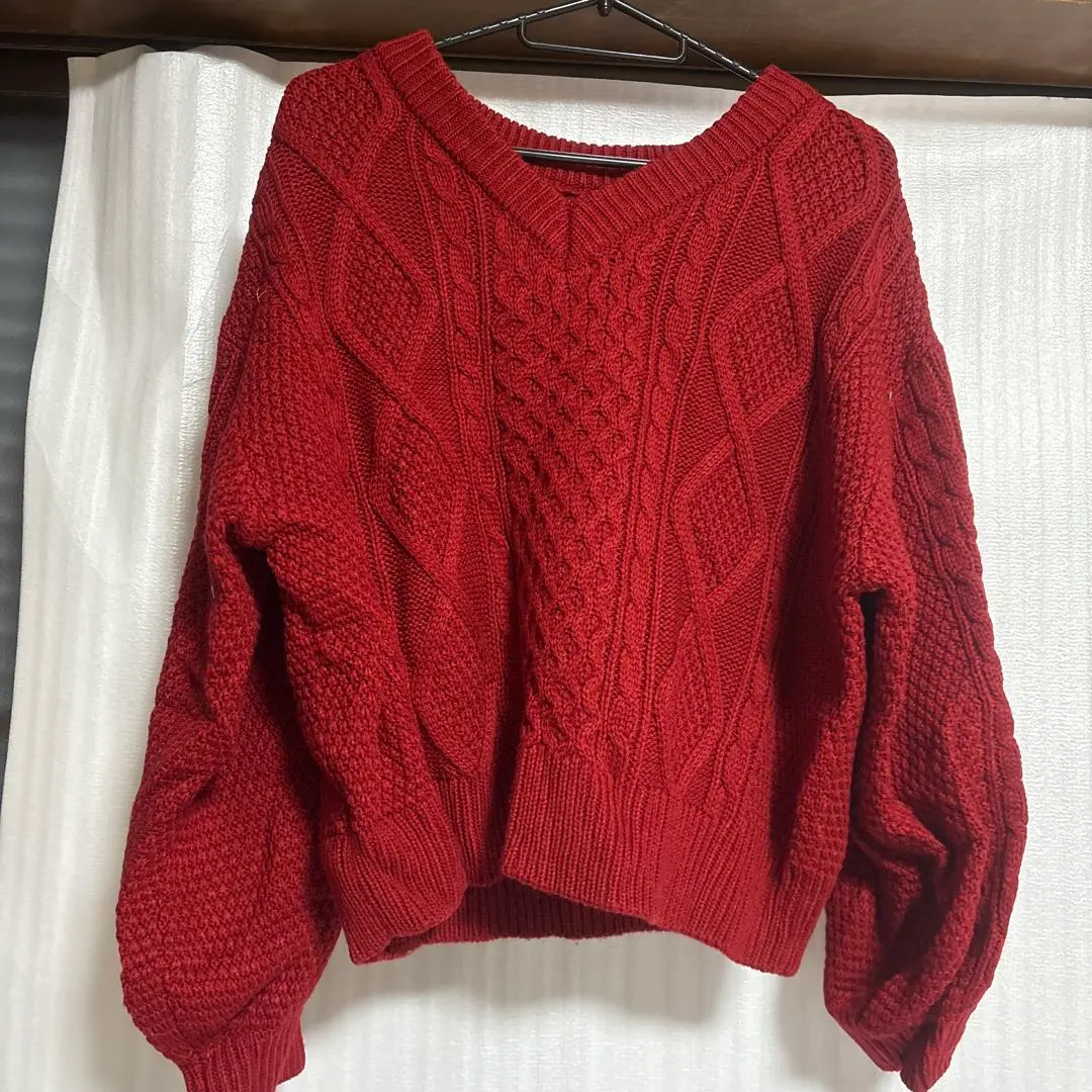 Thumbnail of Red cable knit long sleeve sweater