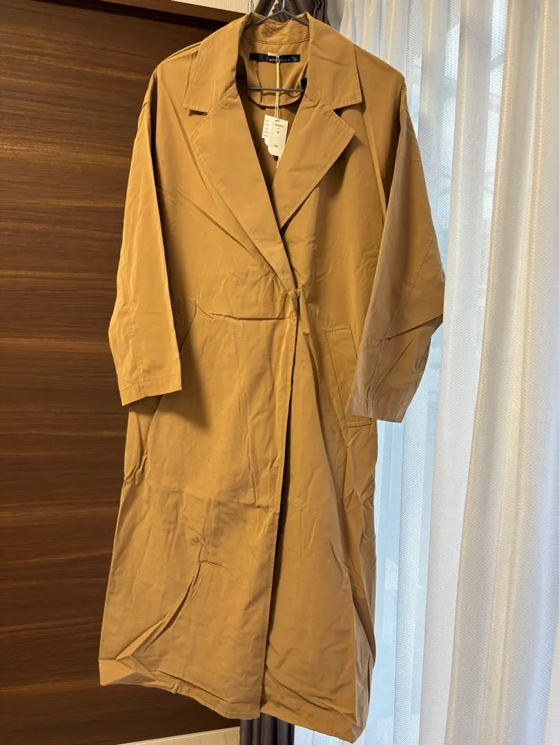 Thumbnail of Brand new, unused, not colorful at all, beige trench coat