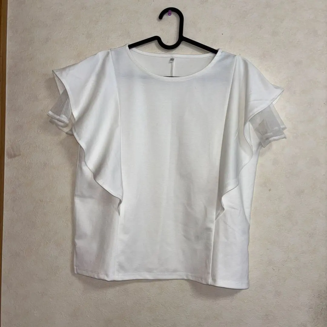 Thumbnail of White, frill-sleeved, sleeveless top