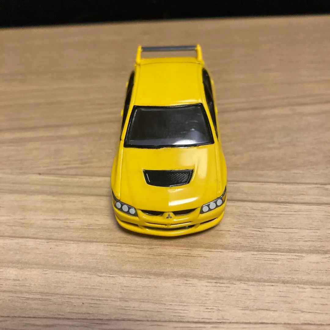 Thumbnail of Johnny Lightning 1/64 Mitsubishi Lancer Evolution, Yellow