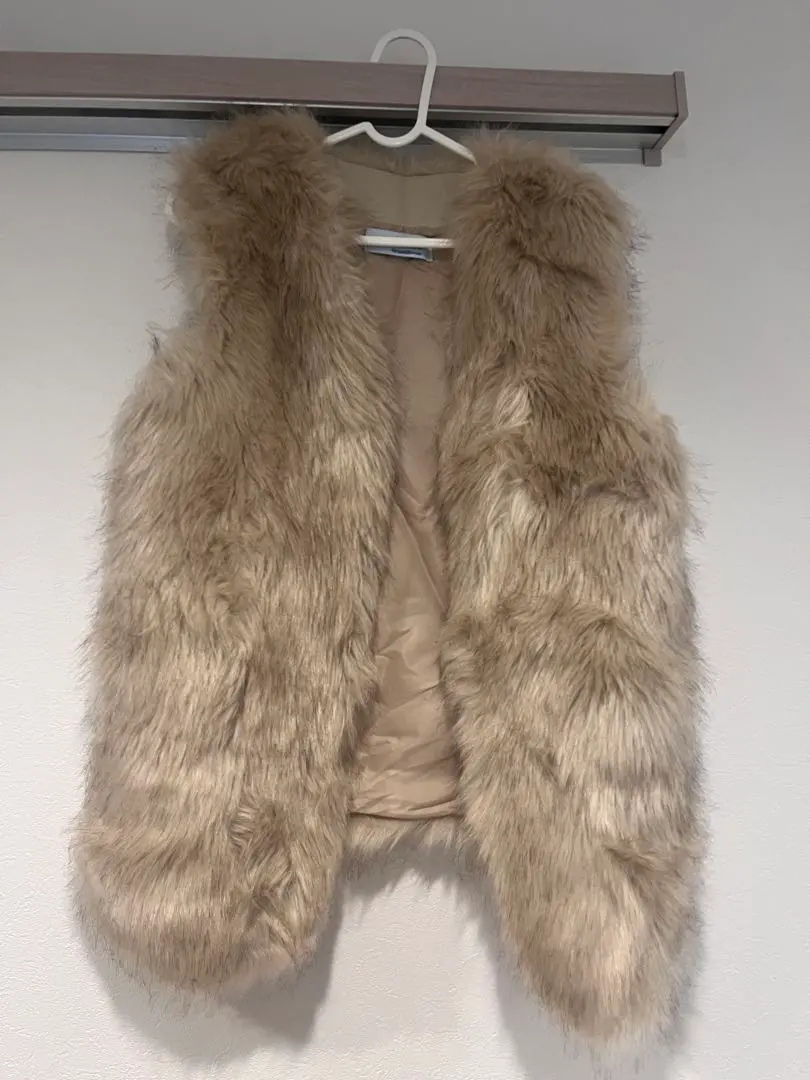 Thumbnail of Beige faux fur sleeveless coat
