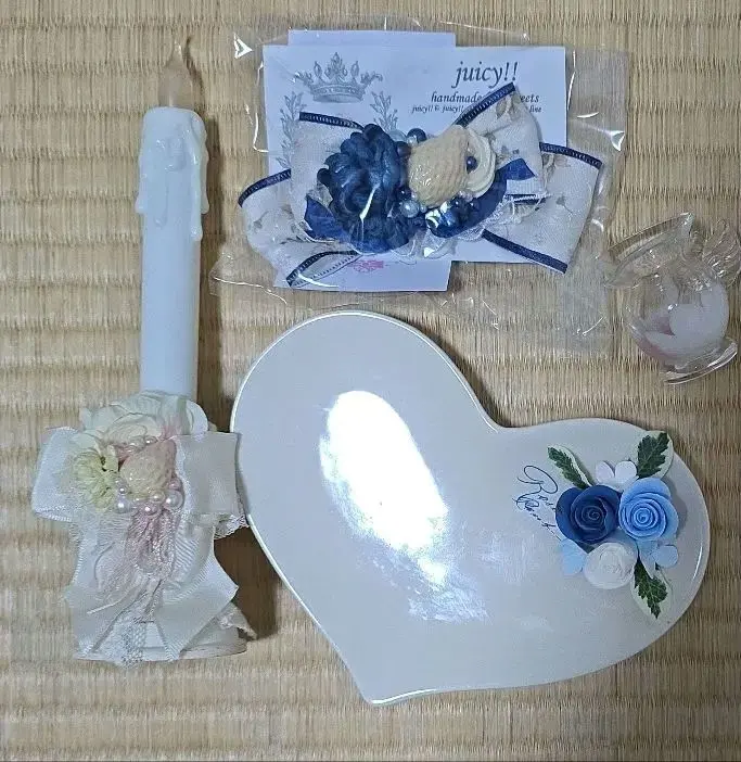 Thumbnail of Assorted miscellaneous goods / Ribbons / Candles / Plates / Bottles / Barrettes / Plate