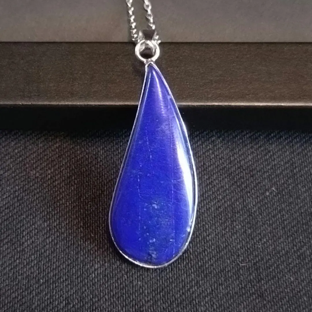 Thumbnail of A single, teardrop-shaped necklace of deep, captivating lapis lazuli.