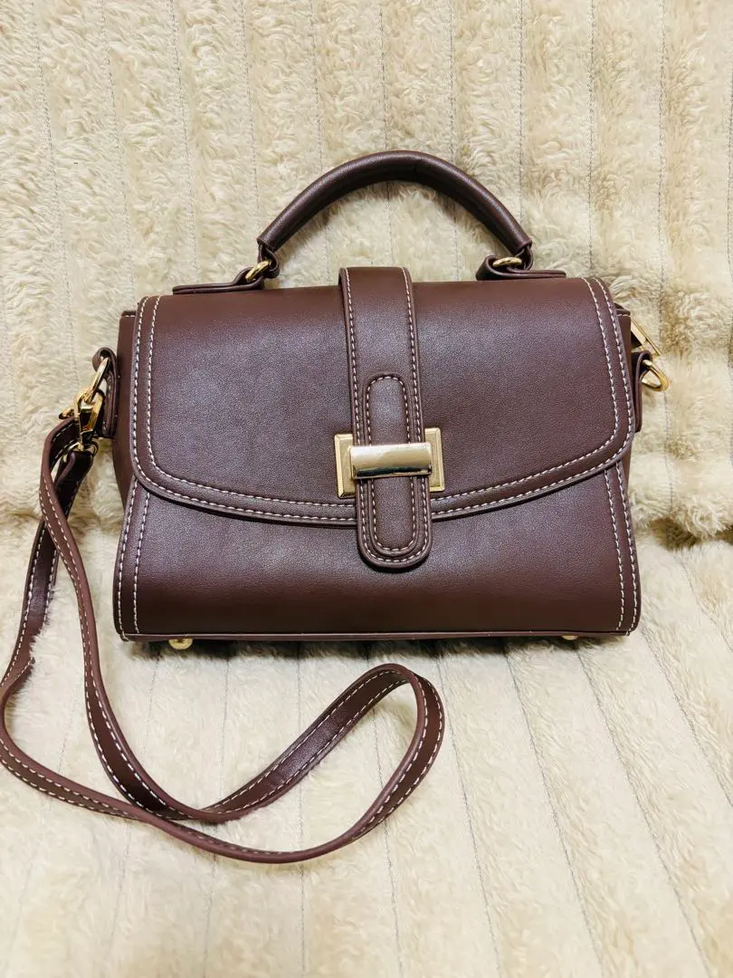 Thumbnail of Brown shoulder bag, flap closure