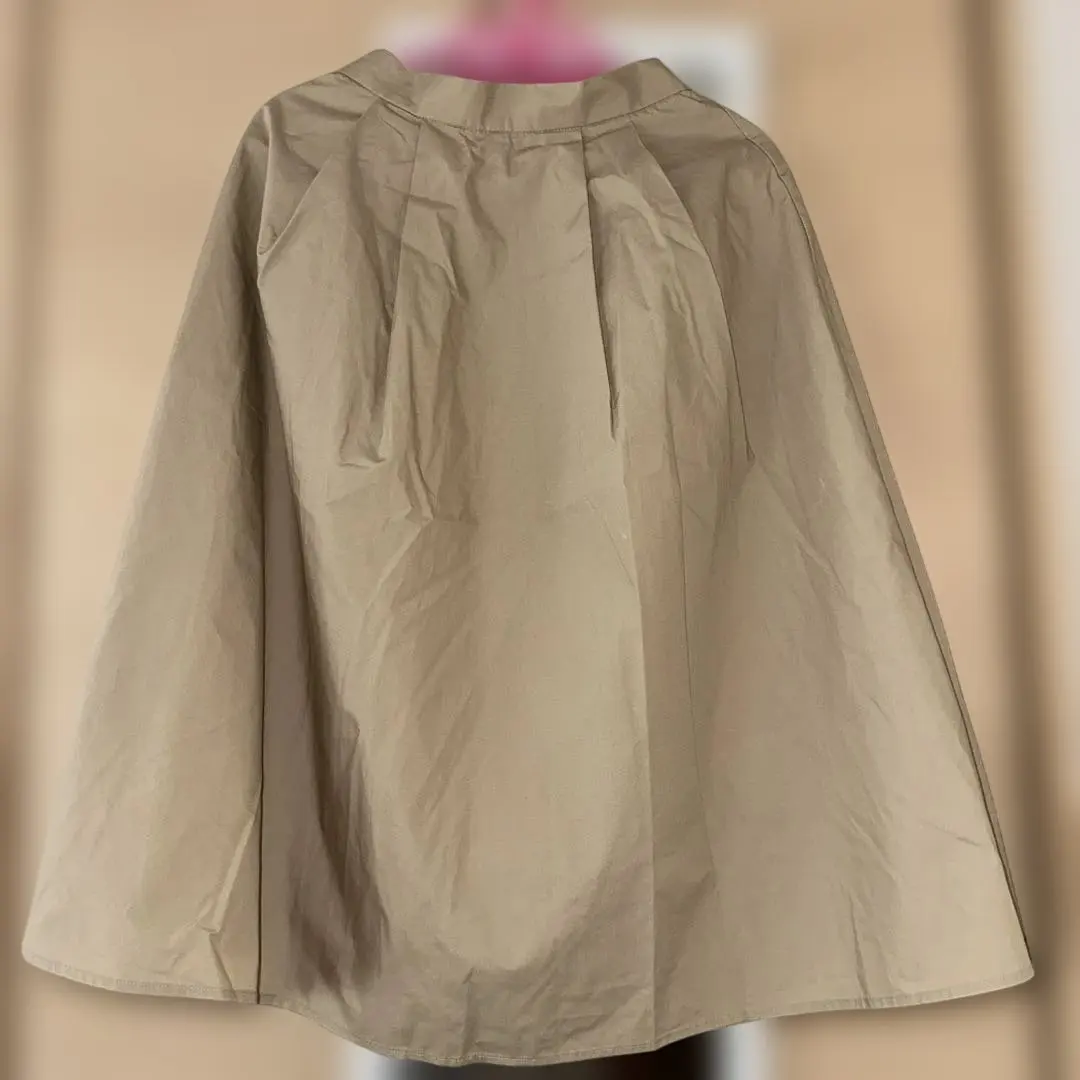 米色 裙子 的縮圖