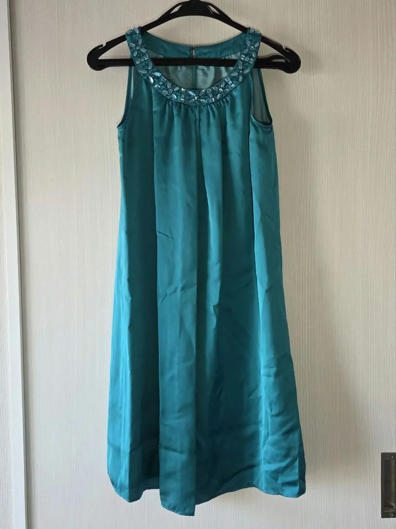 Thumbnail of Turquoise sleeveless dress
