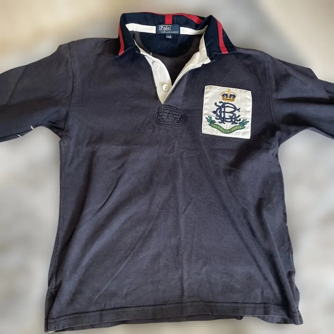 Thumbnail of Navy polo shirt, size M