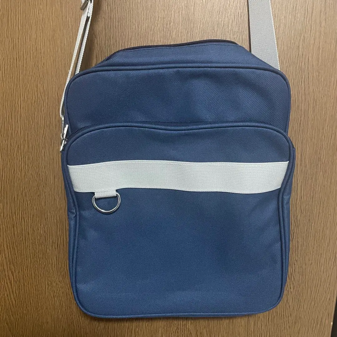 Thumbnail of Navy shoulder bag, school bag with front pocket