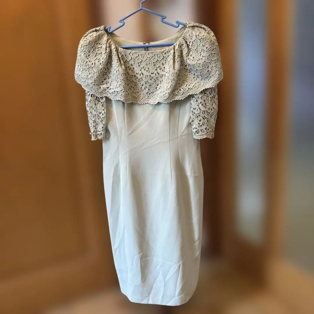 Thumbnail of Light green off-shoulder tight dress