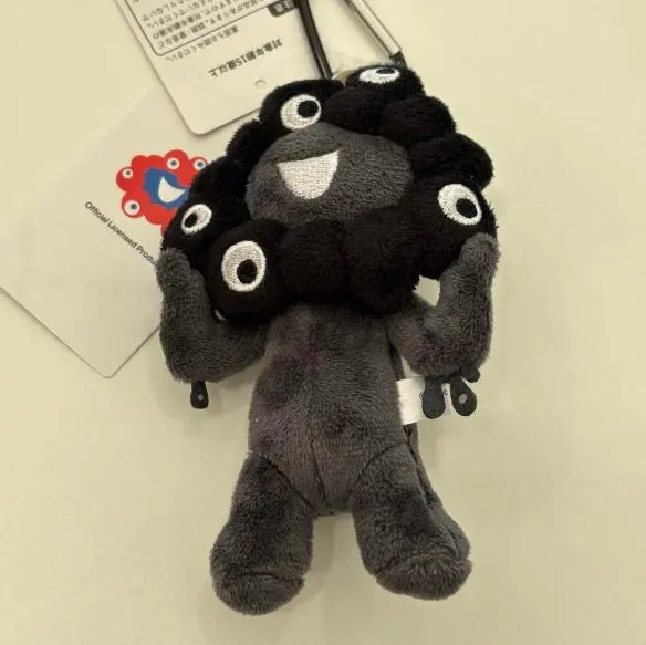 Thumbnail of Black character plush toy, approximately 15cm
