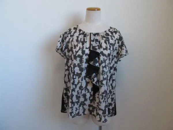 Thumbnail of Black and white patterned top with frills