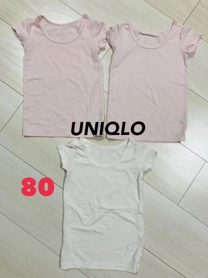 Thumbnail of Uniqlo Heattech innerwear, size 80, short sleeves, pink and white set