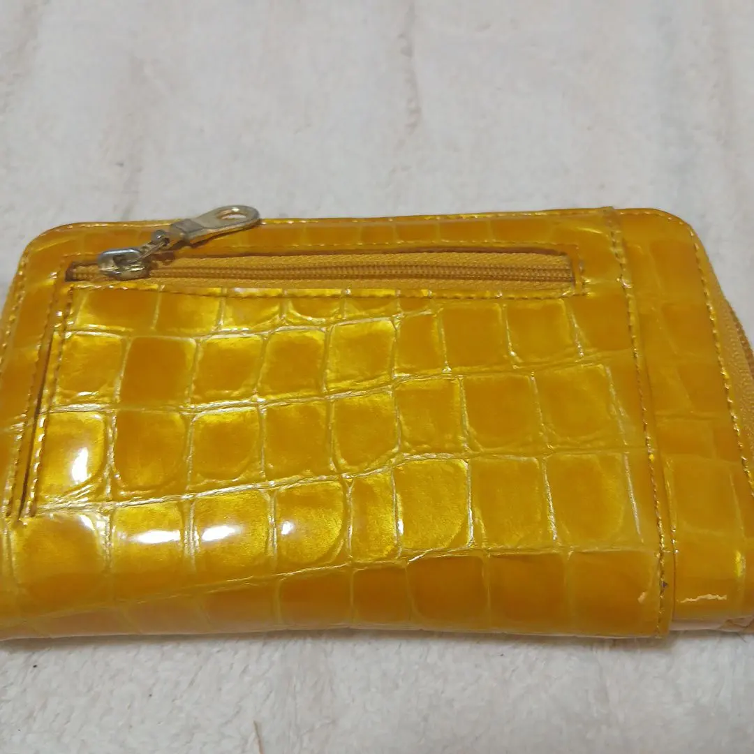 Thumbnail of Enamel yellow bi-fold wallet