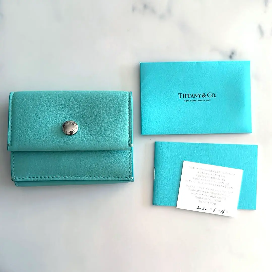 ティファニー リペア済み財布 中古・古着通販】Tiffany & Co. (ティファニー) ターンロック二
