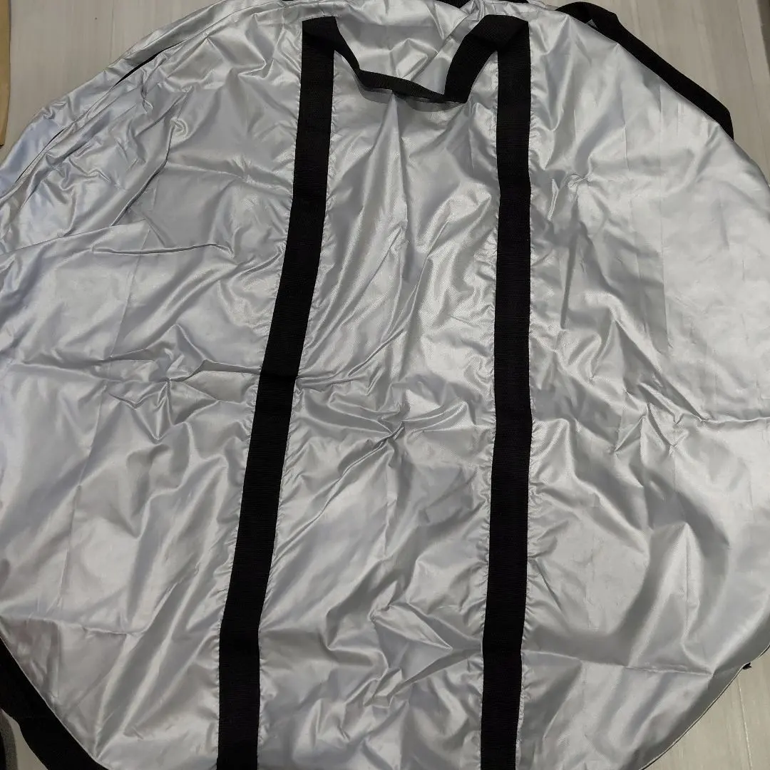 Thumbnail of Four silver tire storage bags