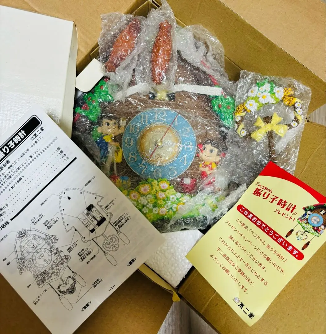 説明書あり　ペコちゃん　振り子時計　掛け時計　不二家　匿名配送 説明書あり ペコちゃん 振り子時計 掛け時計 不二家 匿名配送
