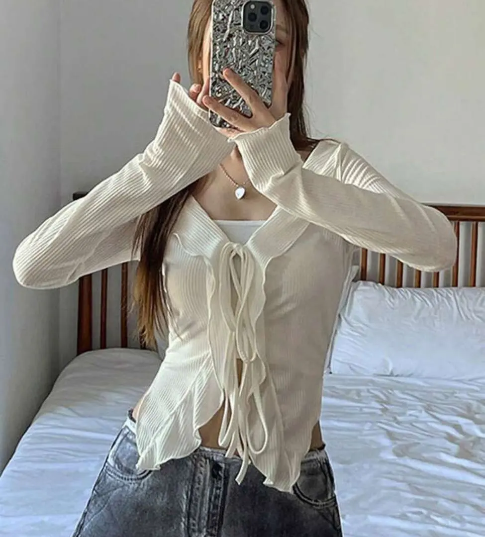 Thumbnail of Ivory long-sleeved top with ribbon