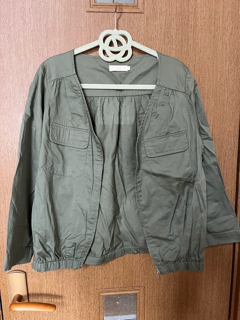 Thumbnail of Olive green collarless jacket