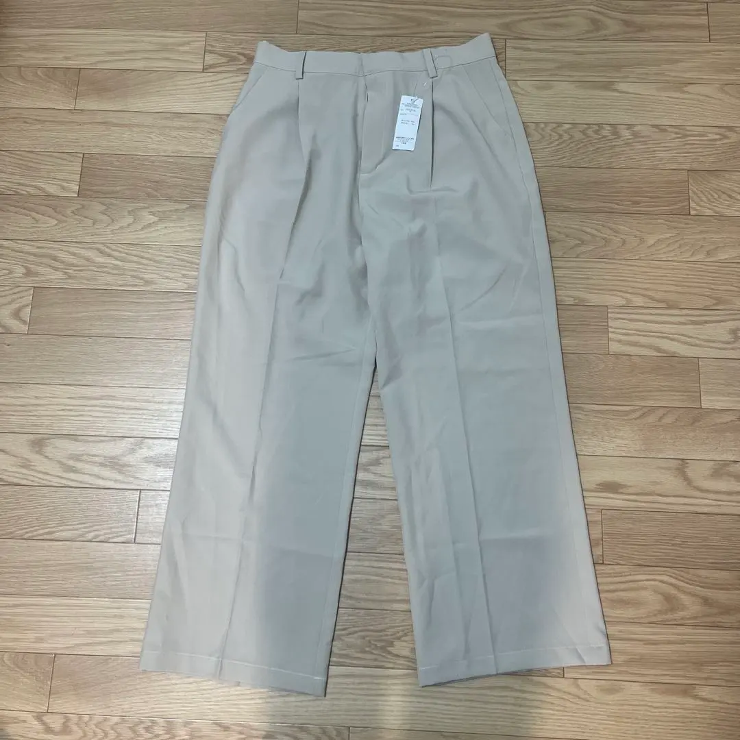 Thumbnail of Beige wide-leg pants with center crease