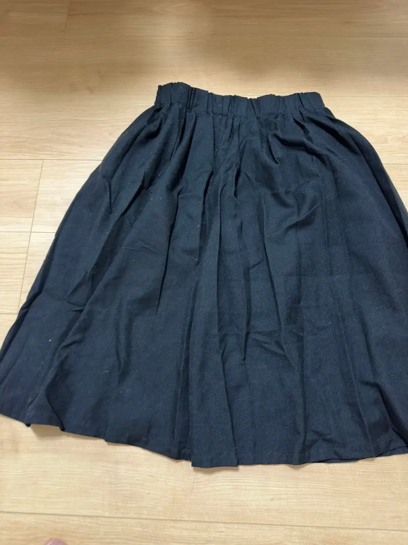 Thumbnail of Black flared skirt, size L