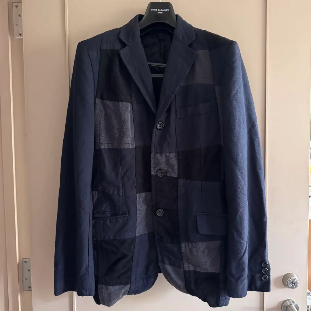 Thumbnail of COMME des GARCONS HOMME jacket with hanger