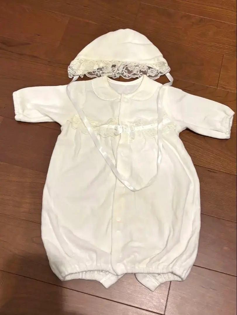 Thumbnail of White ceremony dress with hat