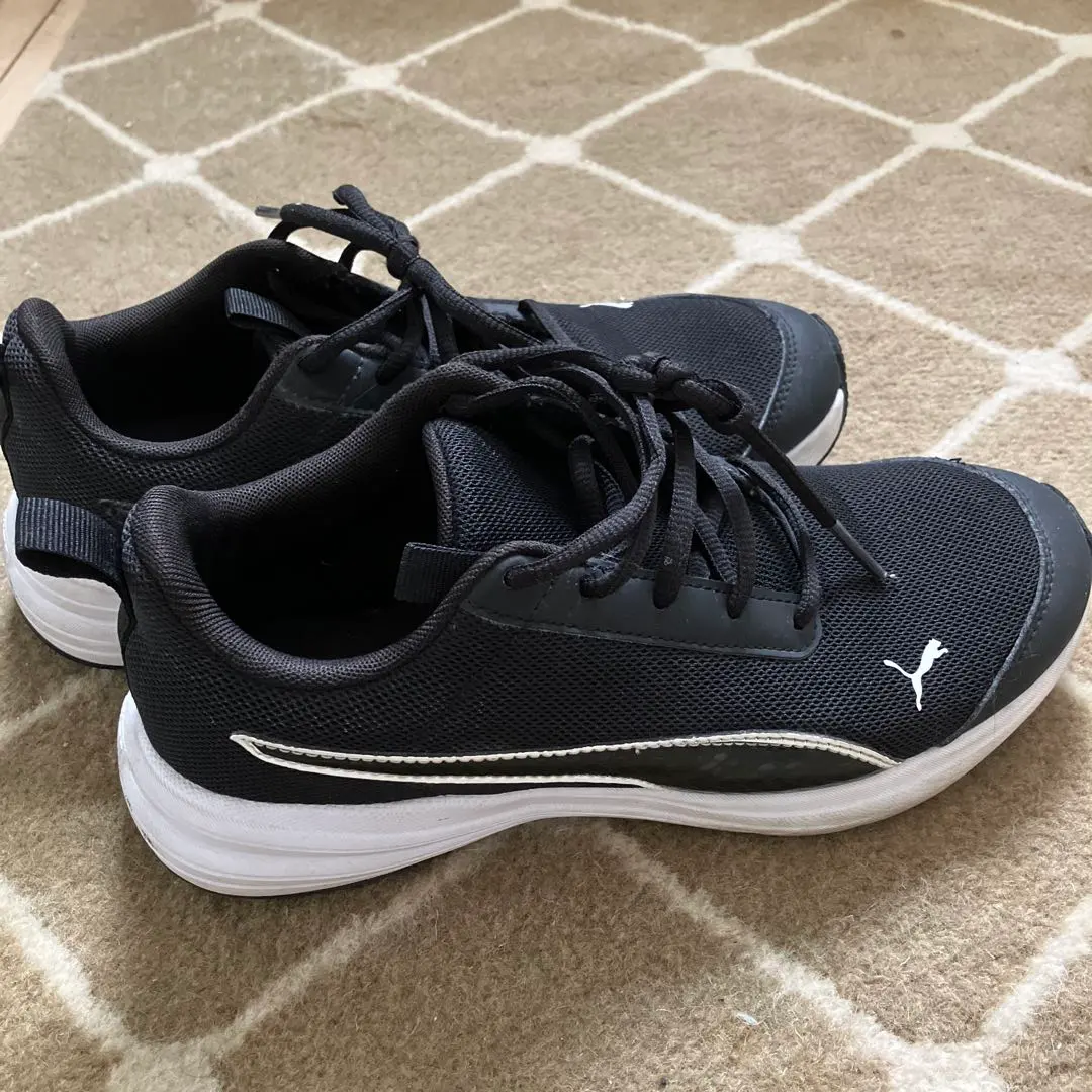 Thumbnail of PUMA black sneakers