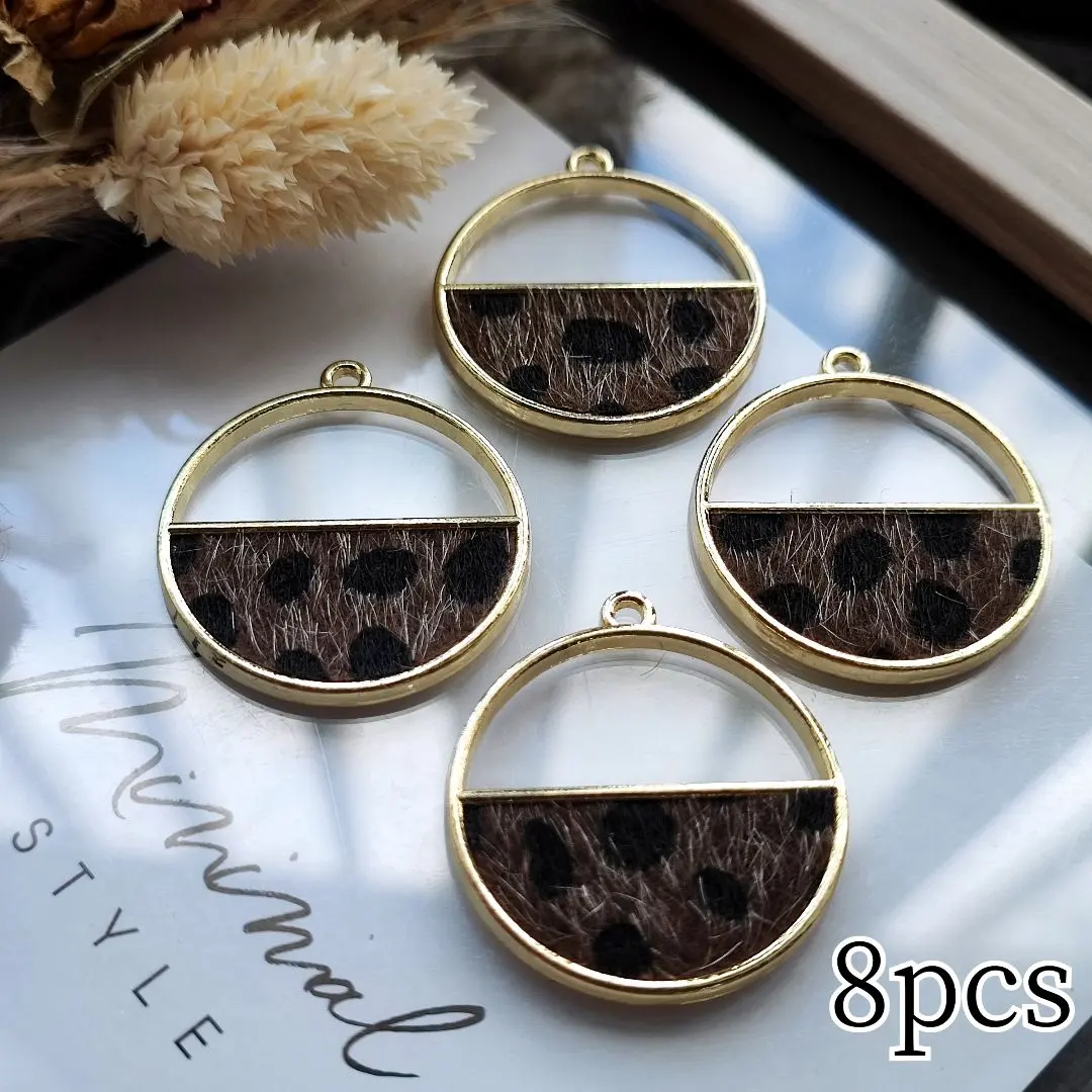 Thumbnail of Slightly oversized charm featuring a leopard print (leopard) faux fur material with a semi-circle cut-out.