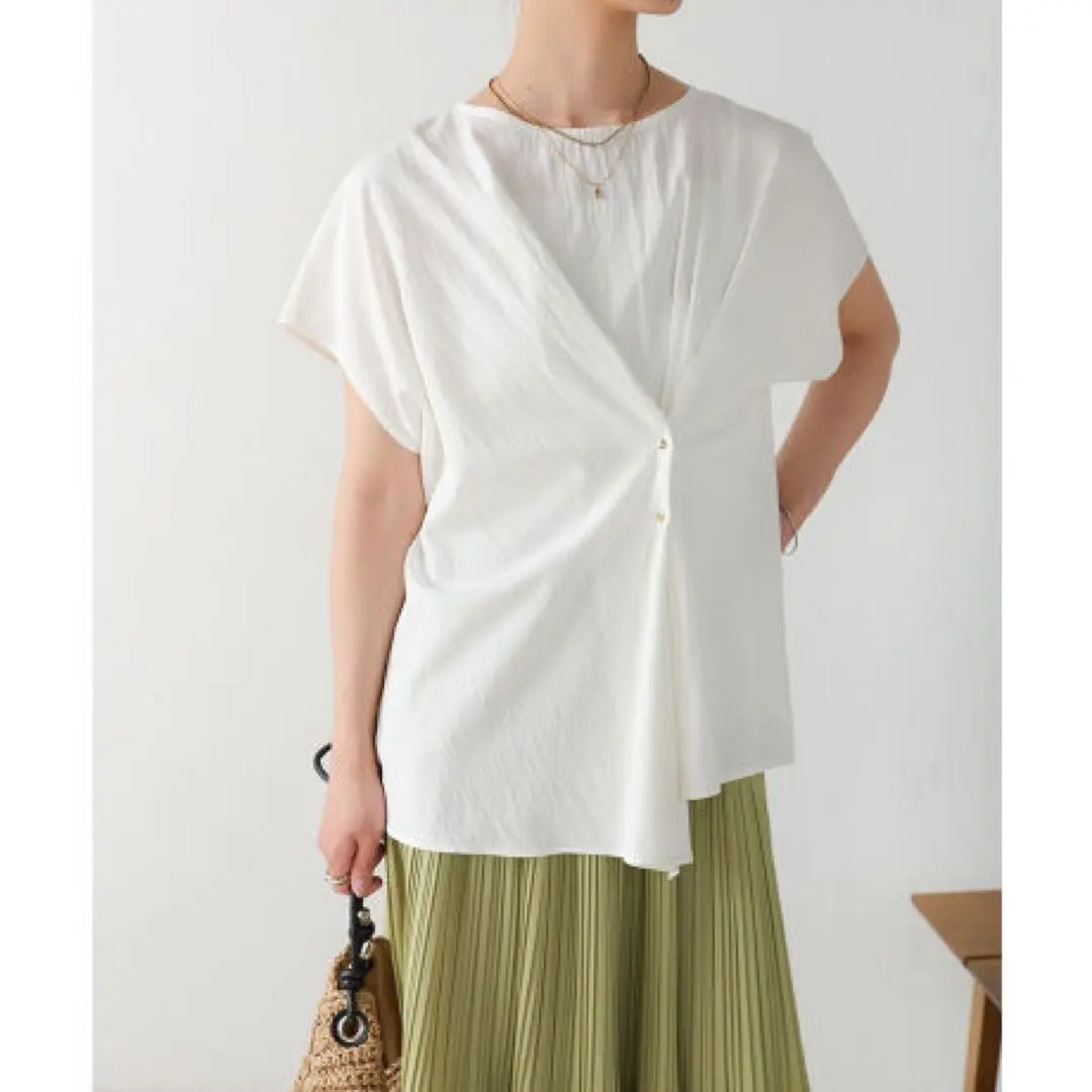 Thumbnail of New with tags Bou Jeloud draped French sleeve blouse, slightly damaged, original price 6900