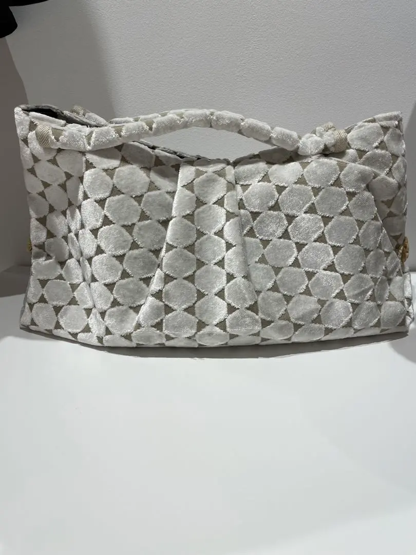 Thumbnail of Brand new, unused clutch bag, greige color, size M