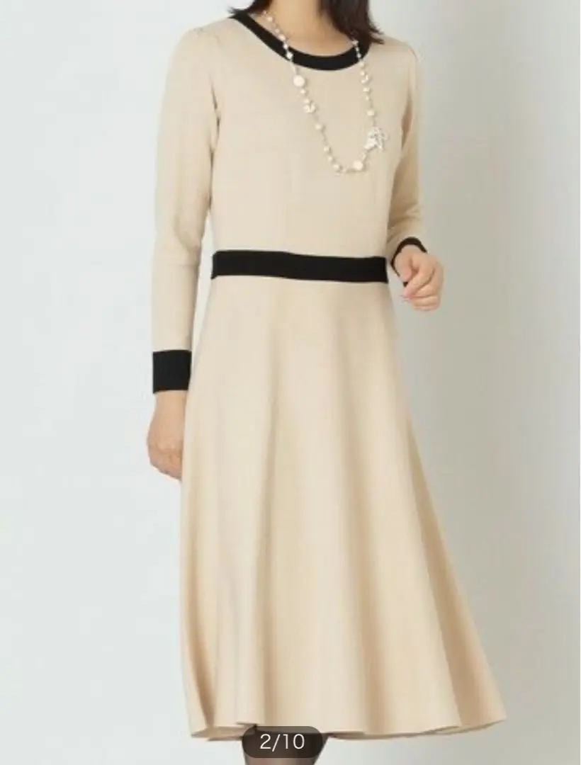 Thumbnail of Beige long-sleeved knit dress