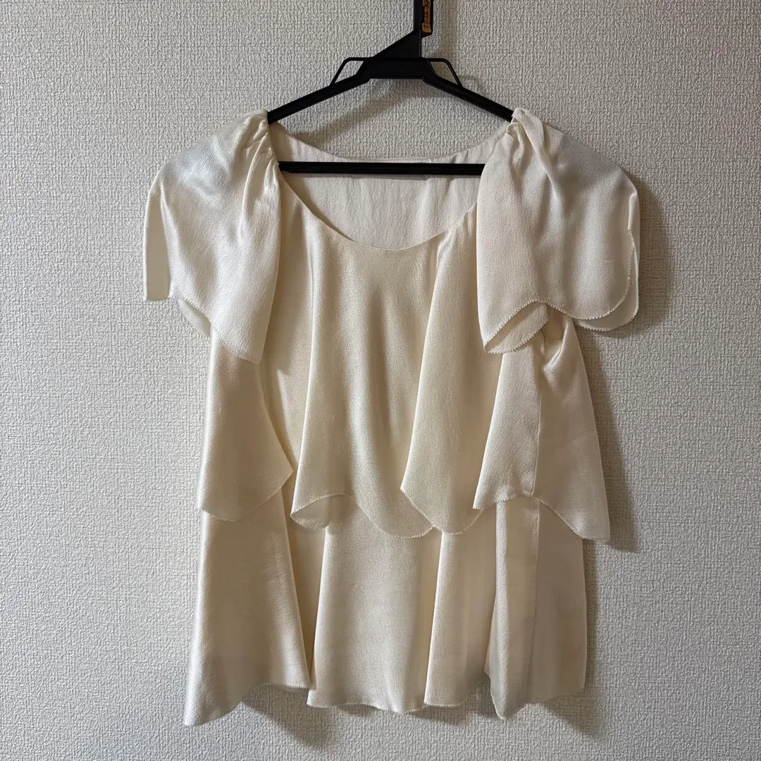 Thumbnail of CRYSTAL FLAP Ivory Frill Short Sleeve Top