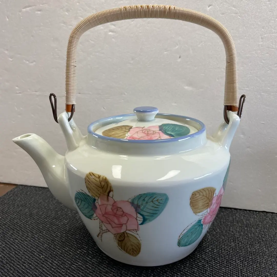 Thumbnail of Floral Pattern Ceramic Teapot with Woven Handle. Large teapot, approximately 12cm x 15cm. 【Marked with "Seiho" (西峰)】