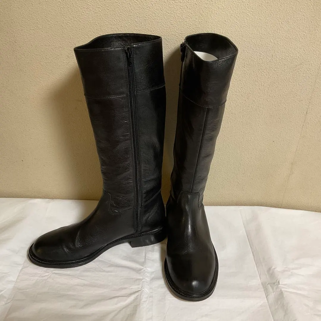 Thumbnail of Black long boots with side zipper