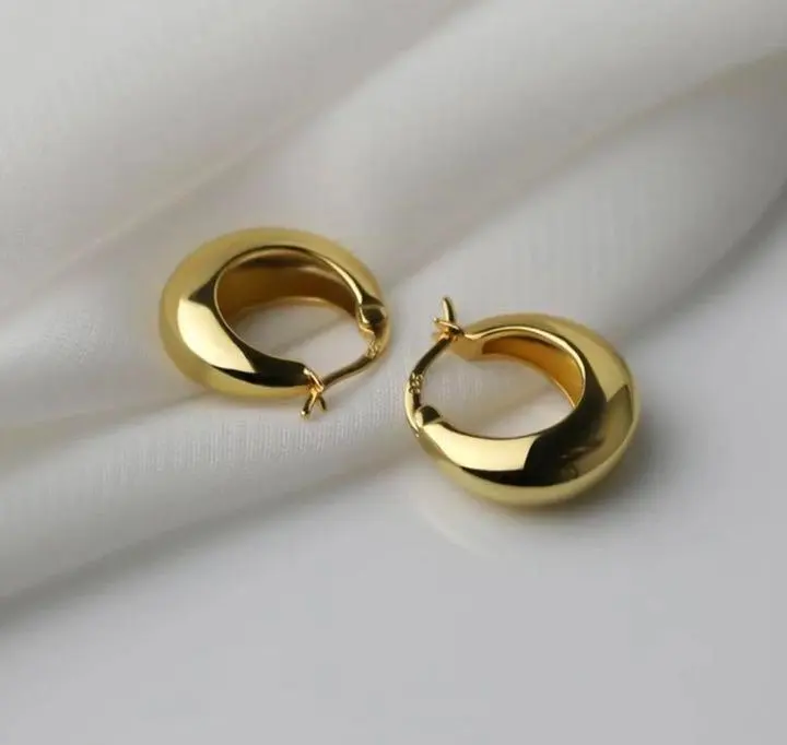 Thumbnail of Gold hoop earrings