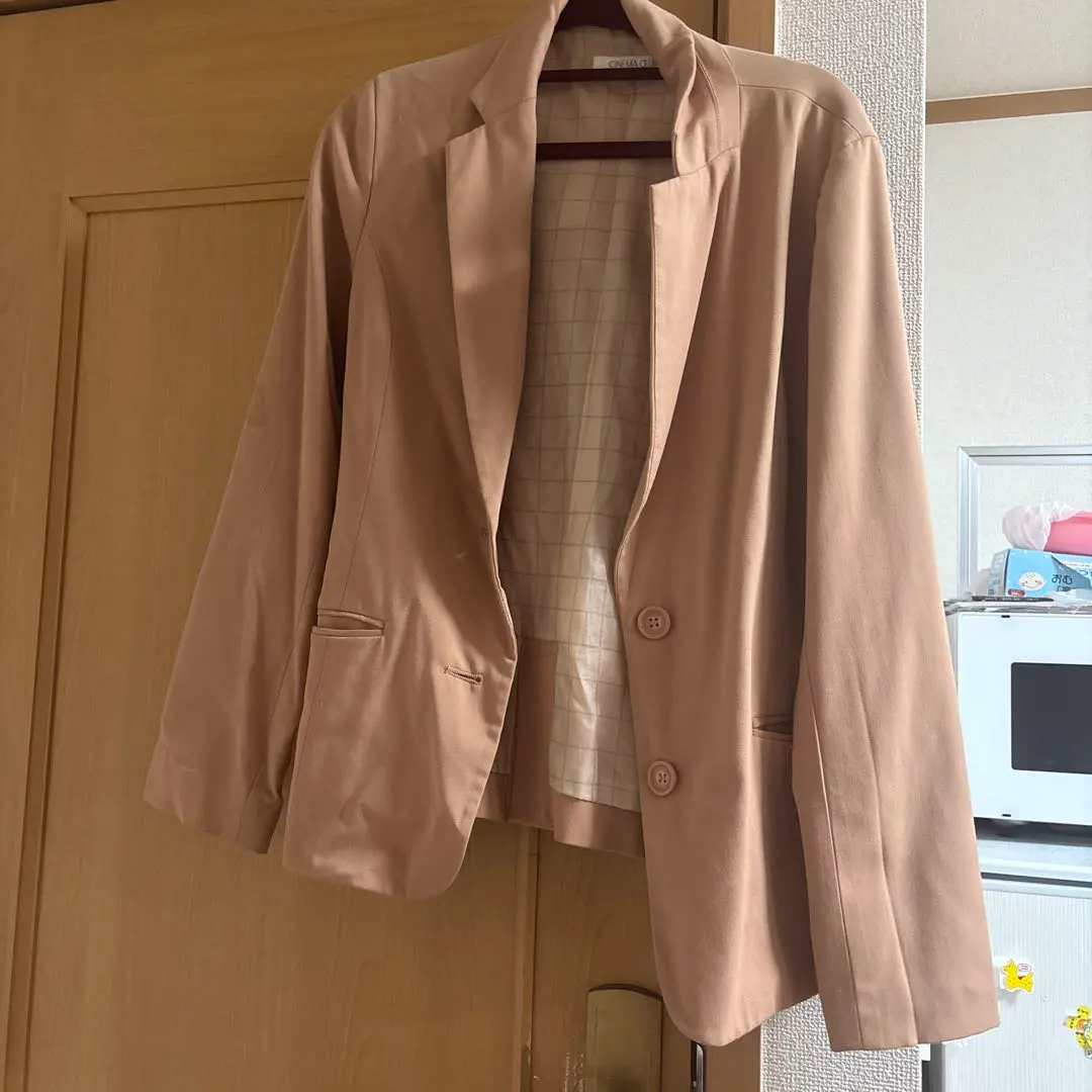 Thumbnail of Beige two-button tailored jacket