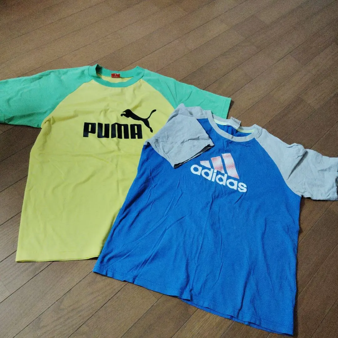 Thumbnail of Puma and Adidas short-sleeved shirts, size 160cm