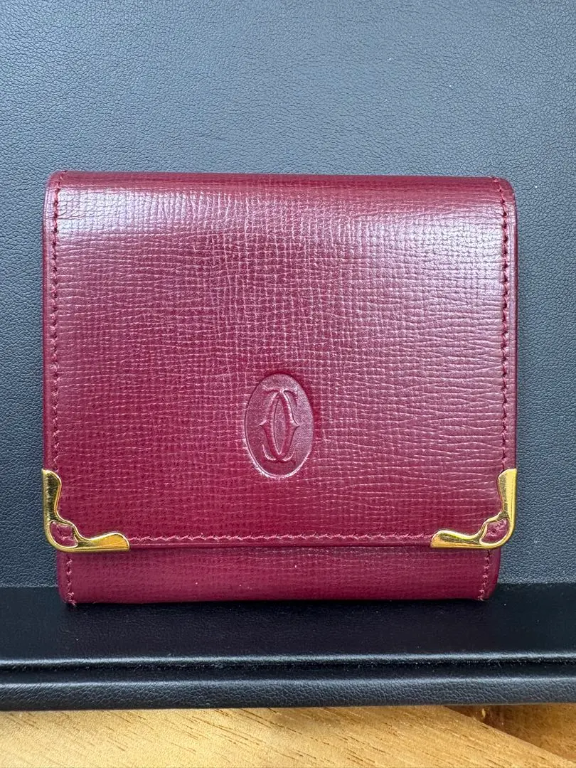Thumbnail of Excellent condition Cartier burgundy coin case