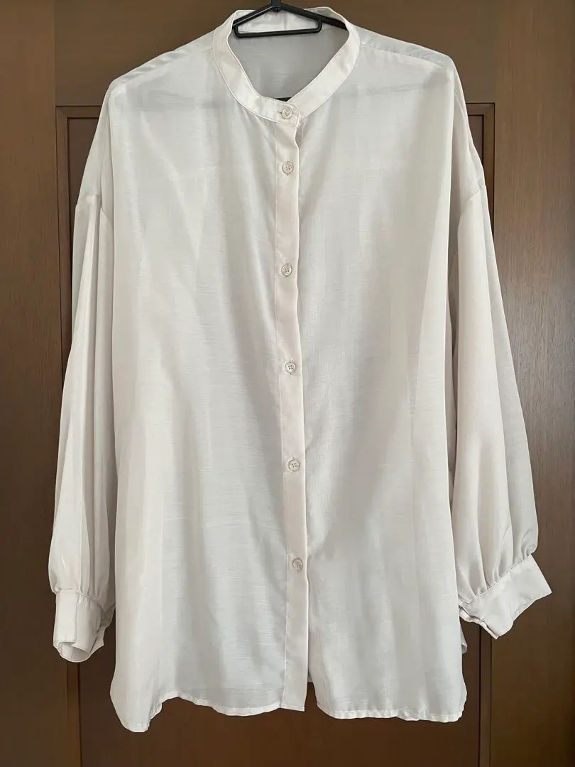 Thumbnail of Women's beige long-sleeved blouse, size M