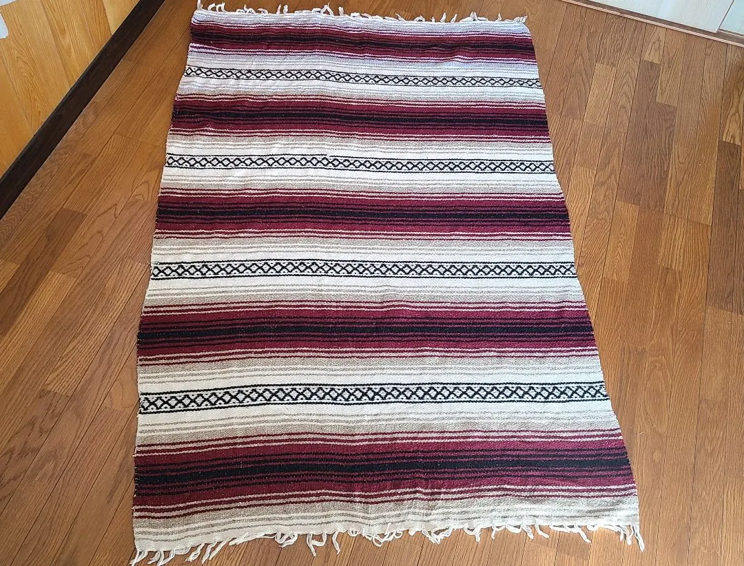 Thumbnail of Red rug