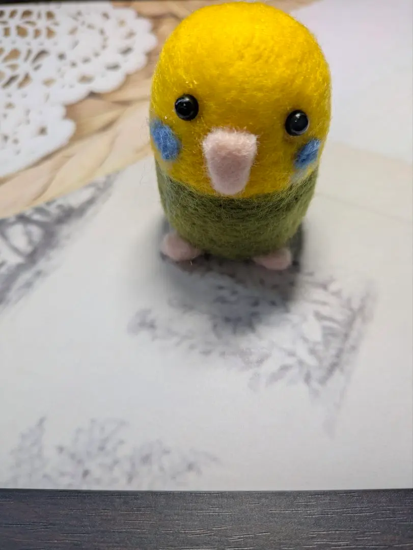 Thumbnail of Wool felt, rolling parakeet
