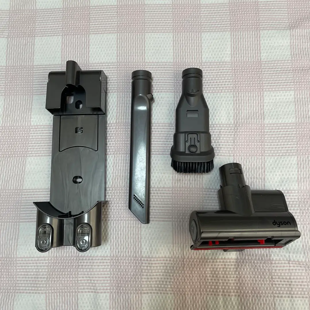 Thumbnail of Dyson stick vacuum cleaner accessory set, charging stand