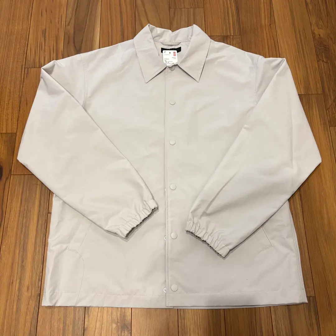 Thumbnail of New with tags, Uniqlo coach jacket, size M