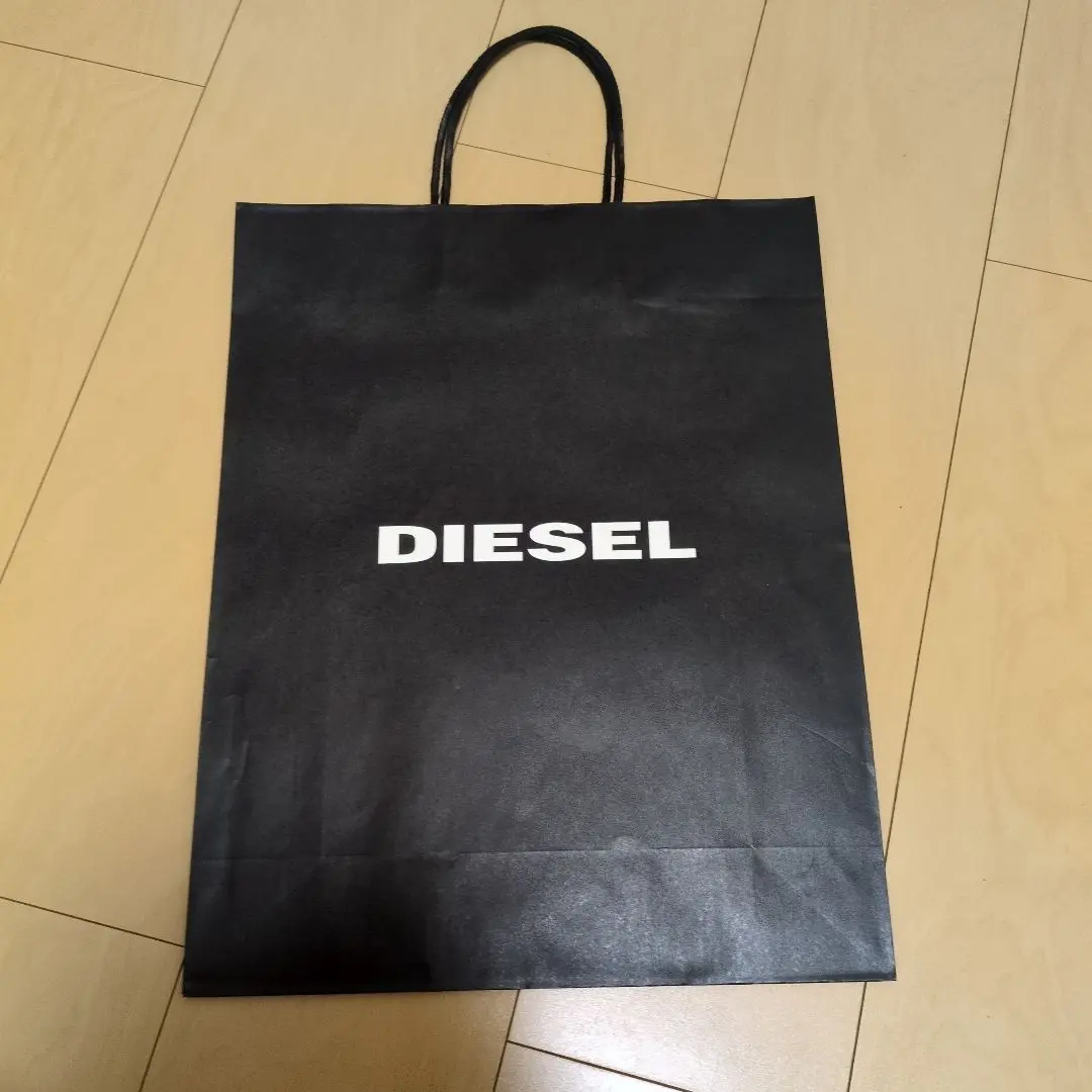 Thumbnail of DIESEL black paper bag